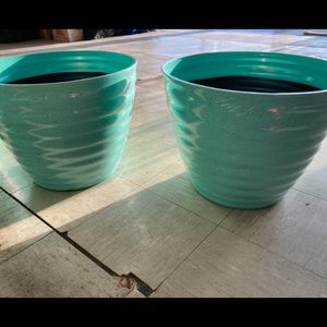 Two matching planter buckets